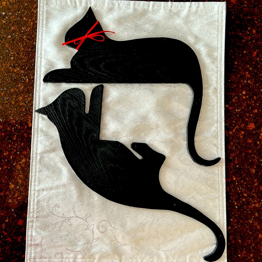 Folk art cats.